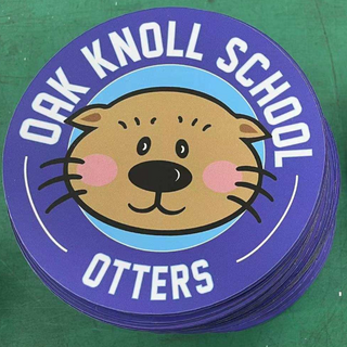Circular 5" diameter Oak Knoll logo magnet