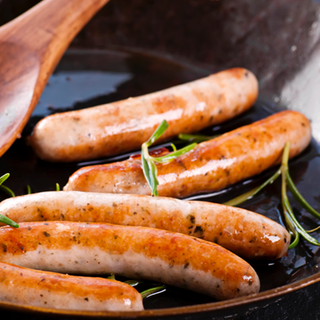 2 Bockwurst and 2 Kielbasa Sausage with onion sauce 