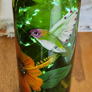 Hummingbird with Orange Flower Green Bottle with Lights