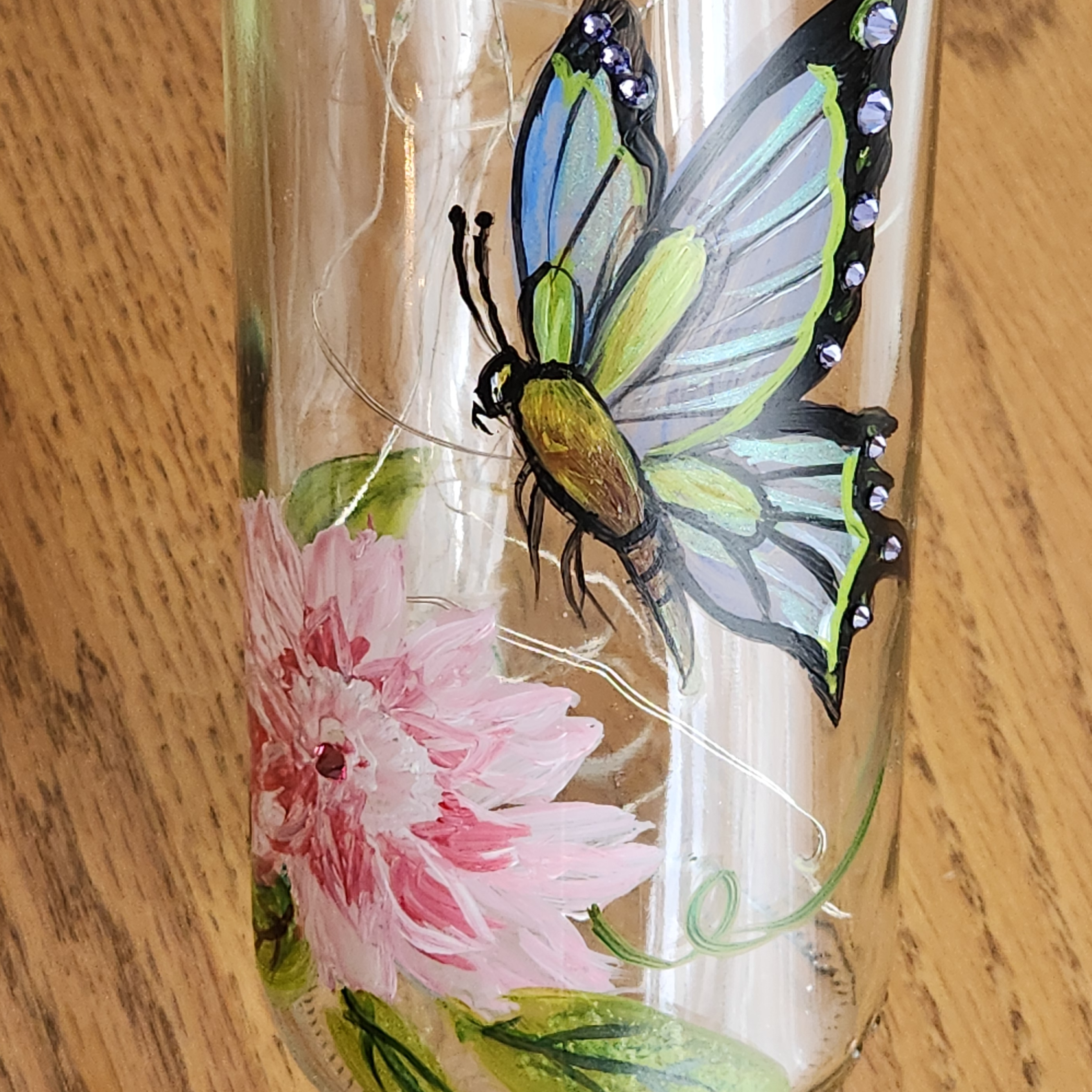 Butterfly with White Pink Flower Clear Bottle with Lights Main Image