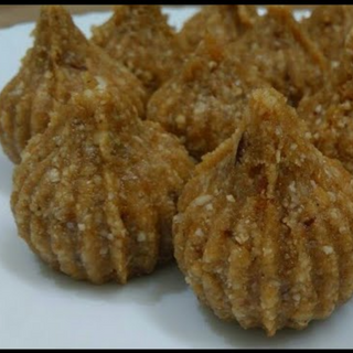 COCONUT & JAGGERY MODAKS    