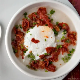 Bacon Congee topped with Bacon Bits and Poached Egg