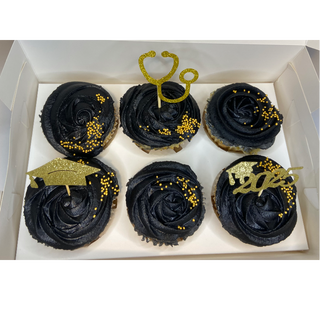 All Black cupcakes with gold toppers
