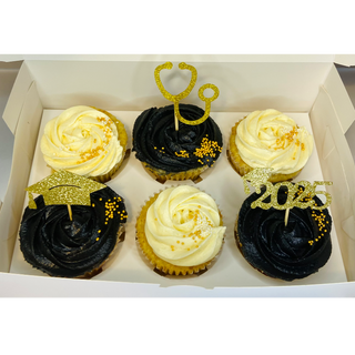 Black and white cupcakes with gold toppers