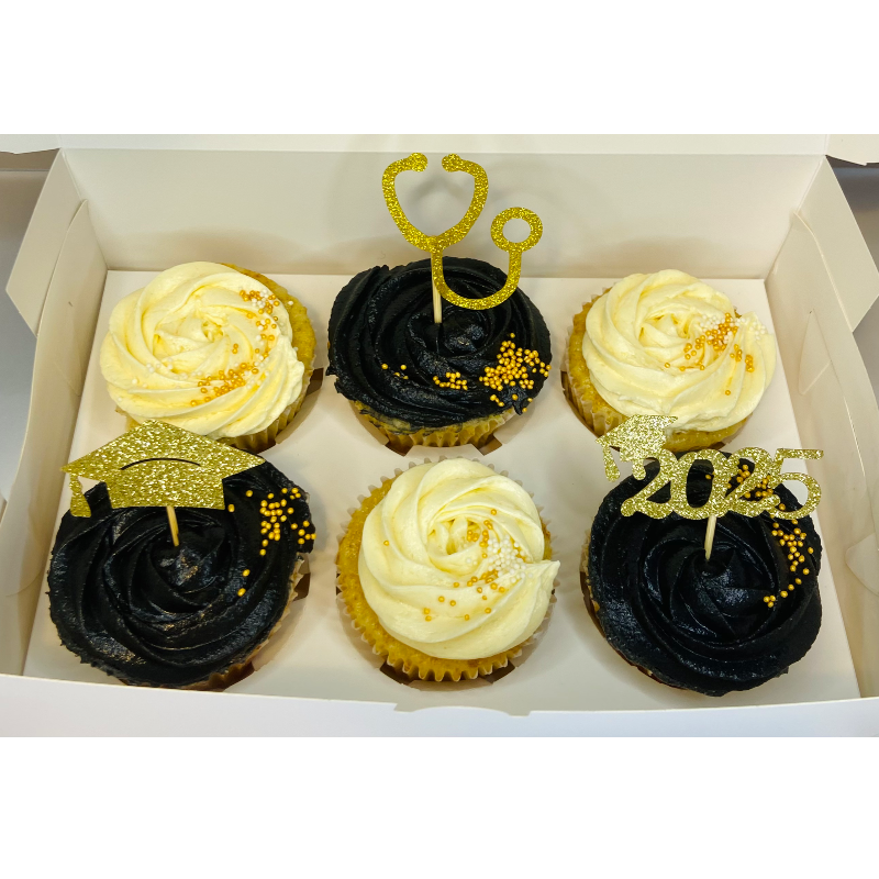 Black and white cupcakes with gold toppers