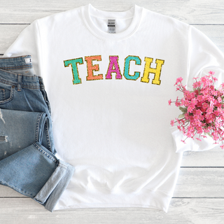 TEACH (chenille letters on white)