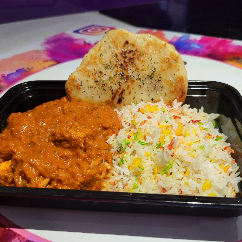 Chicken chasni with fragrant rice & homemade protein garlic nan 
