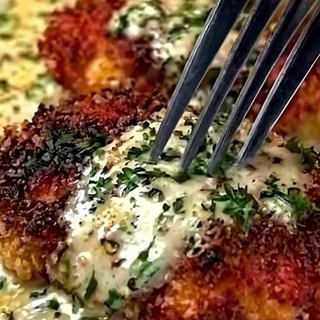 Parmesan Chicken with Creamy Garlic Sauce