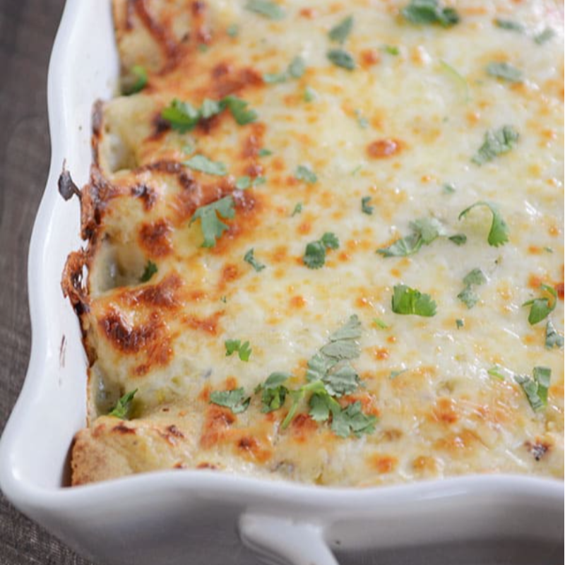 CREAMY GREEN CHILE CHICKEN ENCHILADAS
