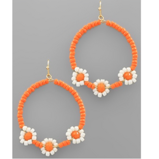 T160- 1.75” Orange/white Beaded Round Sunflower Hoops