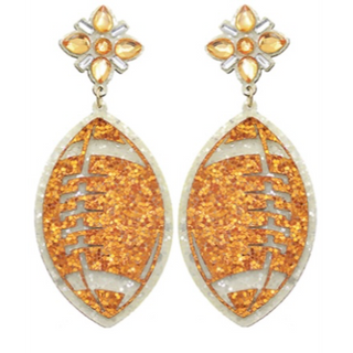 T125- 2.75” orange/white glitter football earrings