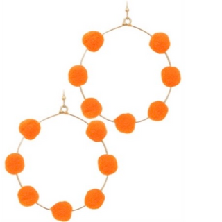 T17 - stationed orange pompom metal circle earrings