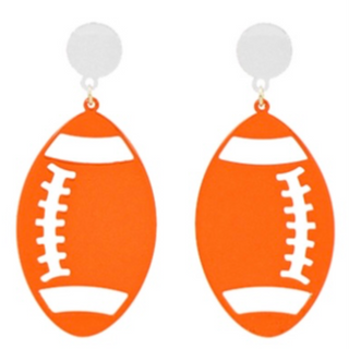 T114- 2.75” White/Orange Football Dangle Earrings-