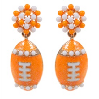 T9- orange & white enamel football ear rings