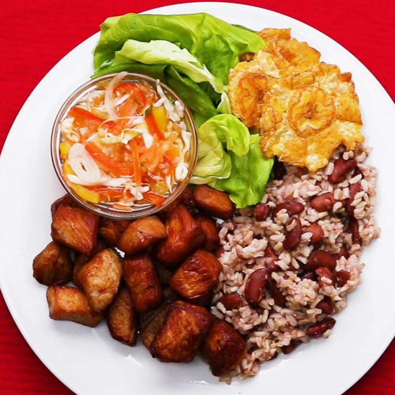 Hatian Griot (fried Pork) Rice and Beans and Pikliz Main Image