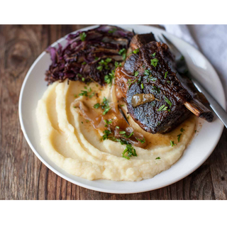 Sous Vide Ribs Topped with Hoisin Gastrique Over Root vegetable Puree. 