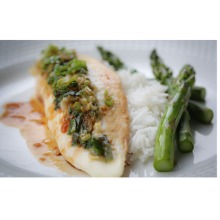 Garlicky lemon tilapia over rice and asparagous