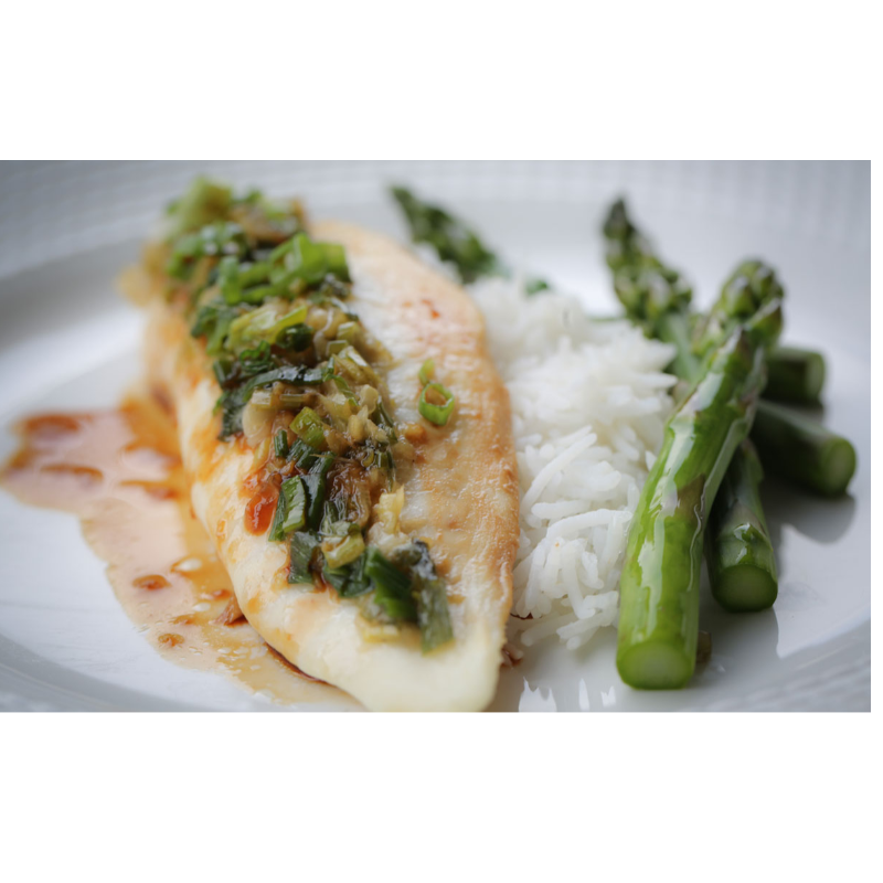 Garlicky lemon tilapia over rice and asparagous