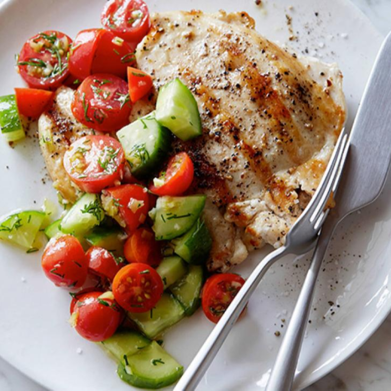 Grilled Chicken with a side of meditaranean cucumber salad - Copy 1 Main Image