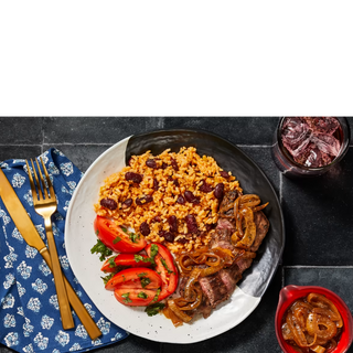 Dominican-Style Bistec Encebollado Steak with Rice & Beans plus a Tomato Salad