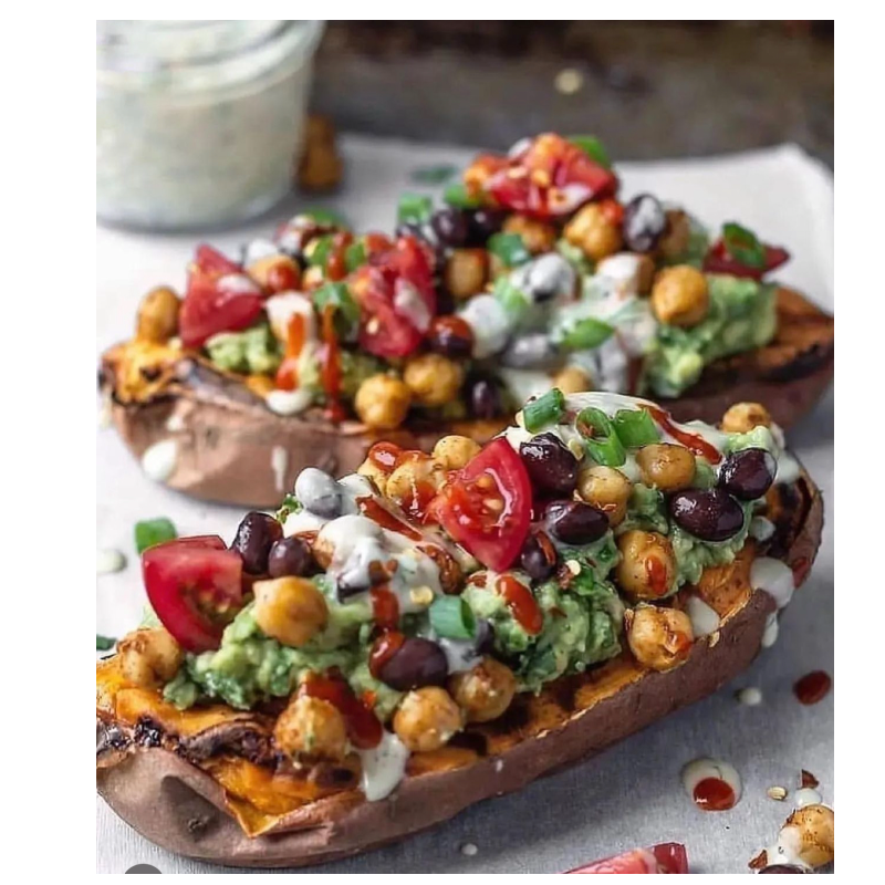 Stuffed Sweet potato/White potato with  chickpeas, black beans, tomato , Guac and Hummu - Copy 5 Main Image