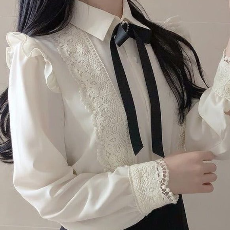 White Blouse With Ribbon Brooch