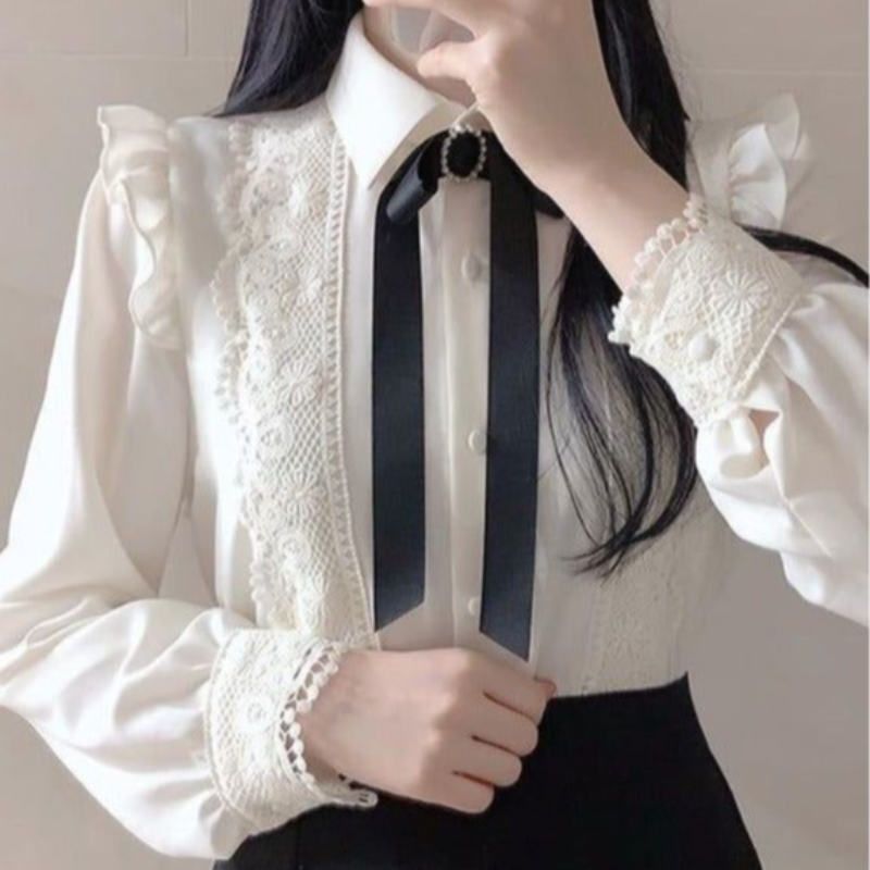 White Blouse With Ribbon Brooch