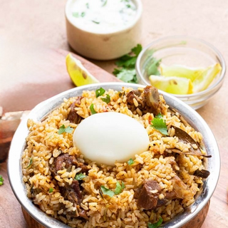 Thalappakatti Mutton Biryani with Raita and Egg