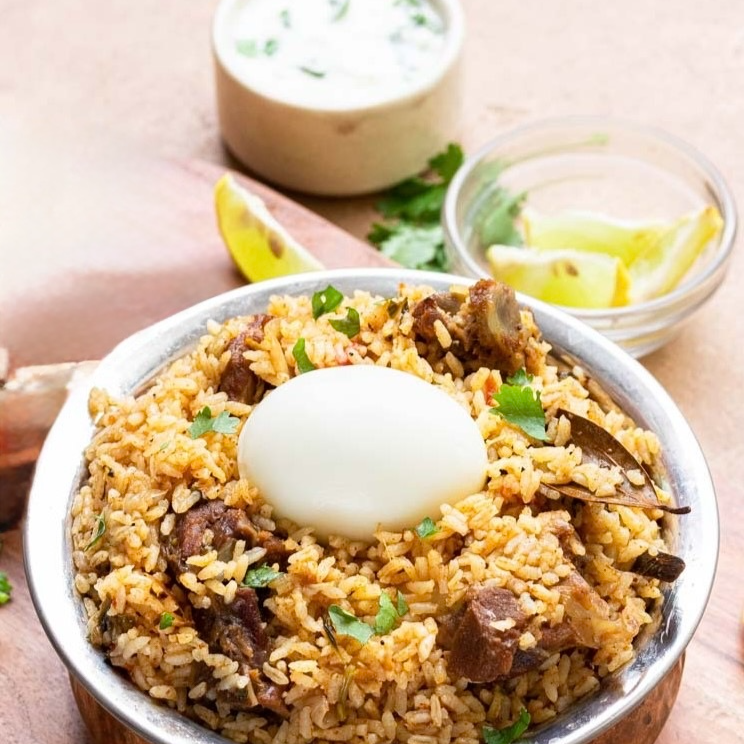 Thalappakatti Mutton Biryani with Raita and Egg