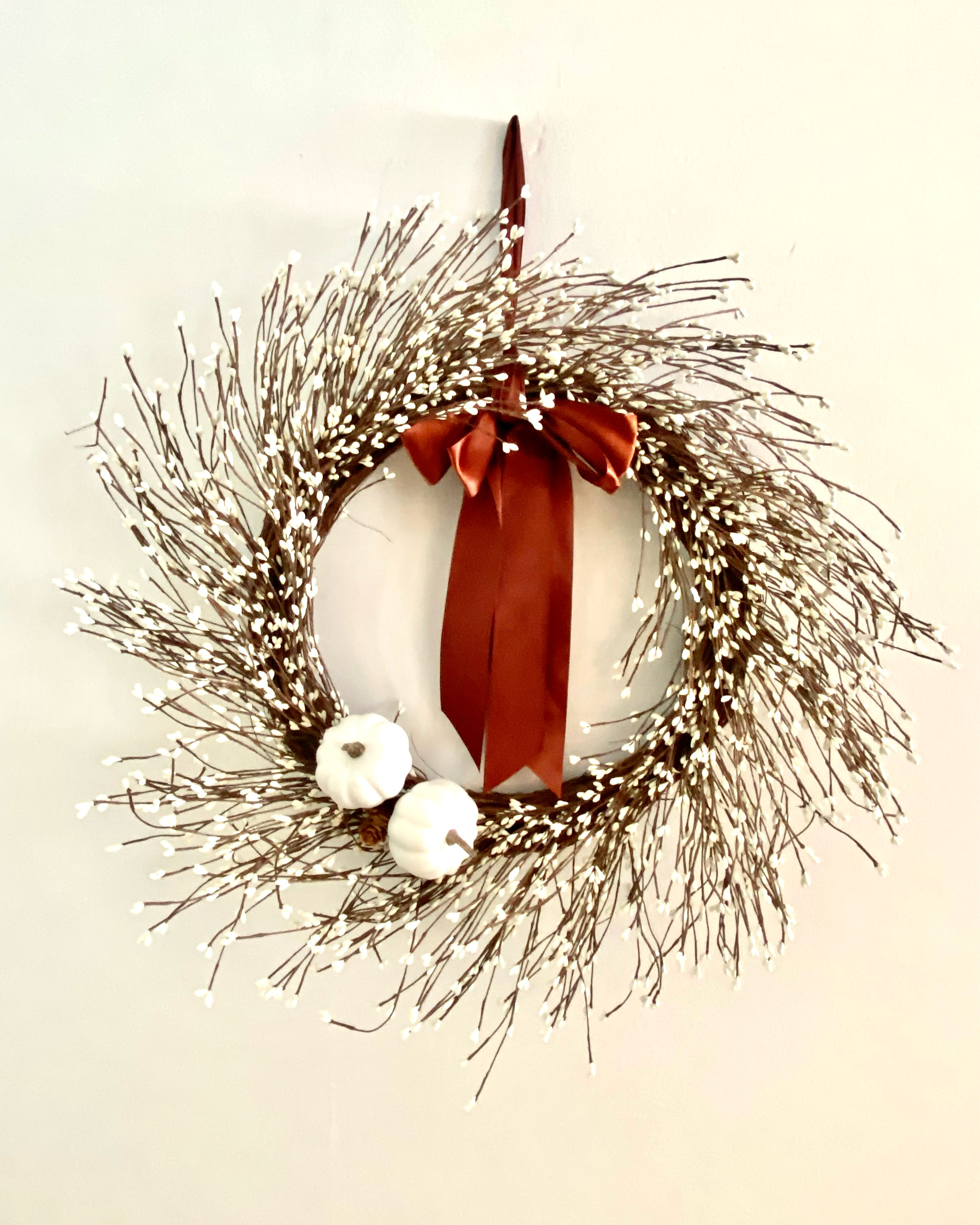 Grapevine wreath with white berry's with brown satin bow (22-24 in)