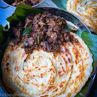 2 Parotta and Beef Curry