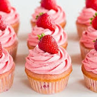 Strawberry cupcake with strawberry icing Image
