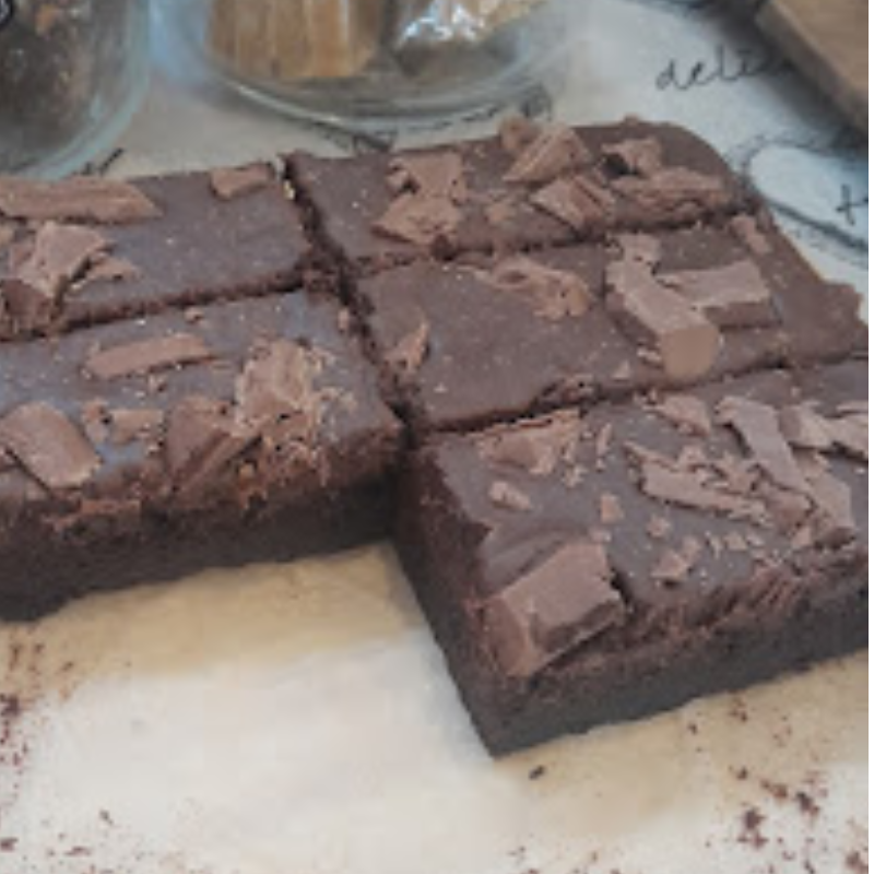 Deluxe Brownies: 
fudgey brownies with chocolate ganache and Lindt Chocolate shards  Main Image