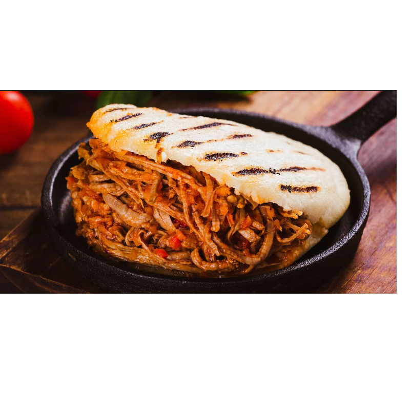 Arepas con Carne / Corn Pattie with Shredded Beef