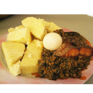 Boiled yam and palava sauce