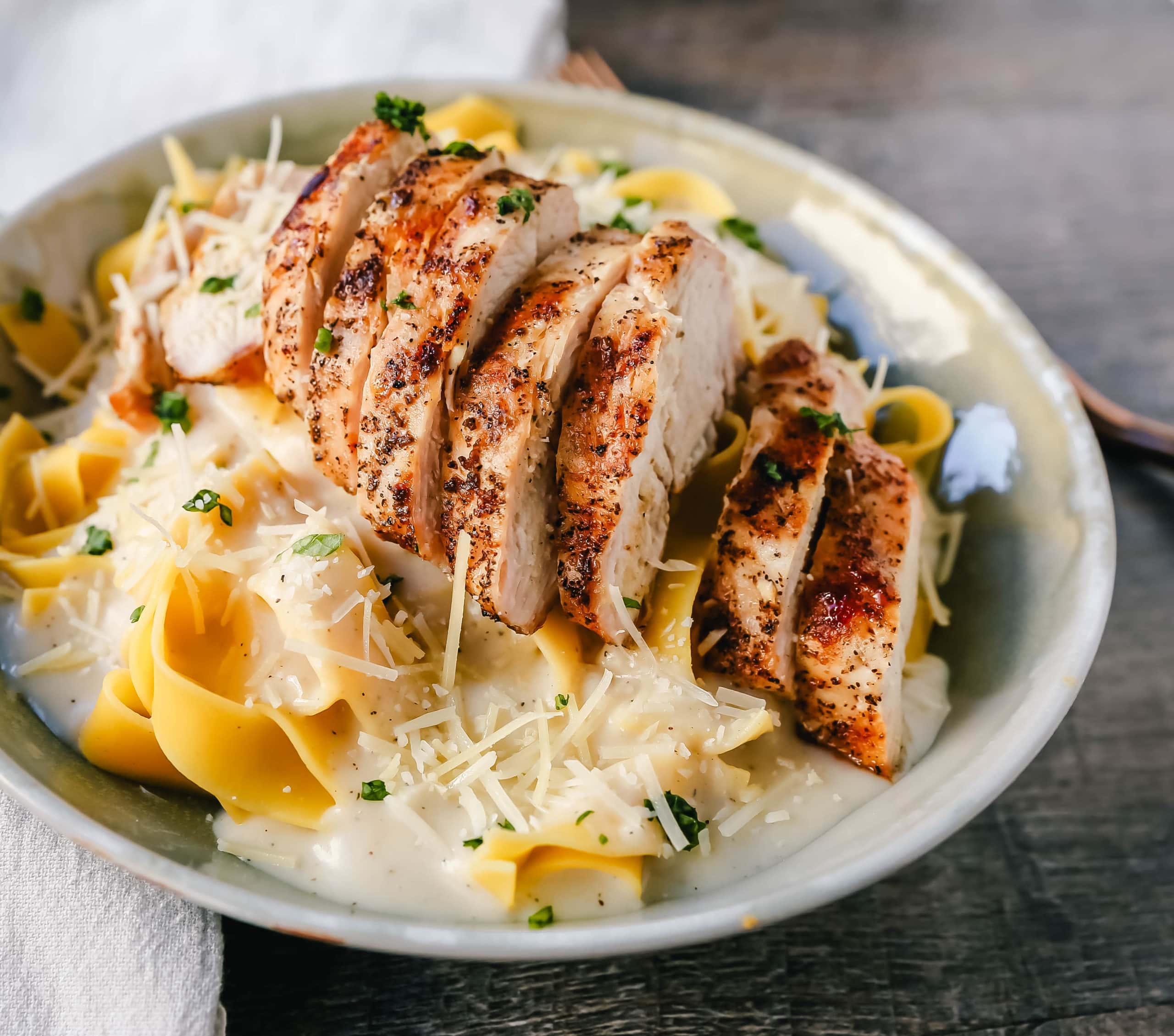 Grilled Chicken Over Fettuccine Alfredo Main Image