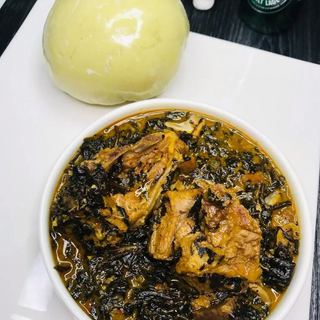 Rich Bitter Leaf Soup served with Pounded Yam